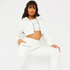PrettyLittleThing Cream Cropped Embroidered Zip Hoodie